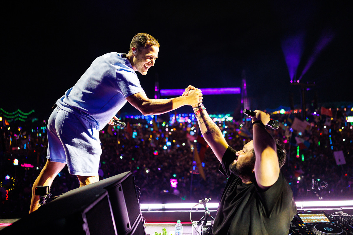 Mike Posner and Deorro shake hands at EDC Las Vegas 2025