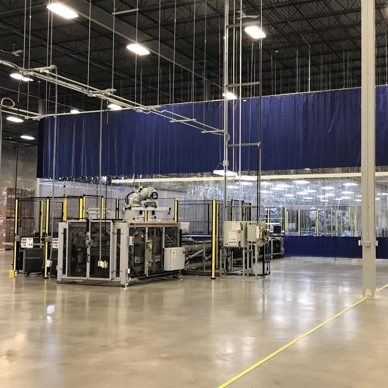 Industrial curtain installed in a flexible enclosure area