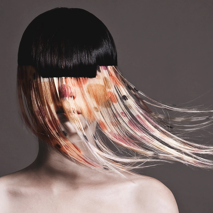 Brown-black Jellyfish haircut with the top layers left longer and layered