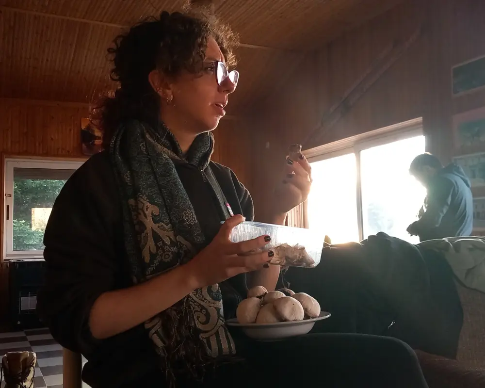Ioanna cleaning mushrooms to cook