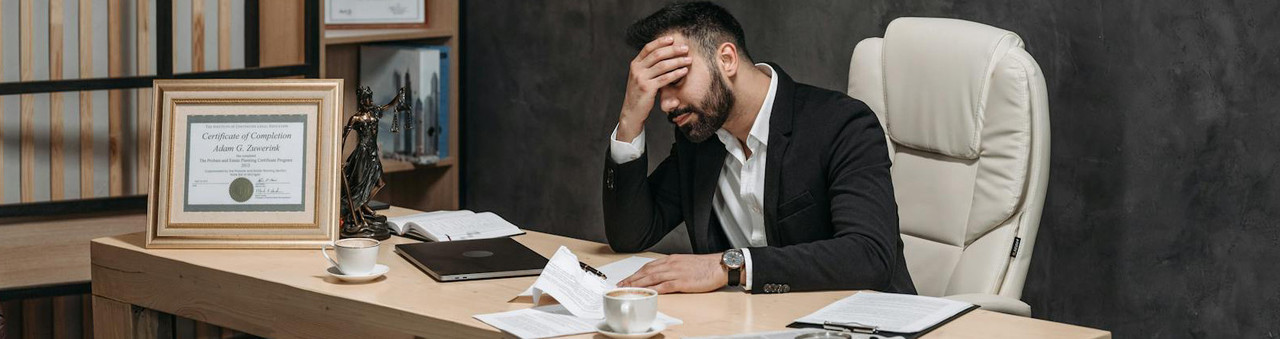 A businessman stressed by his work