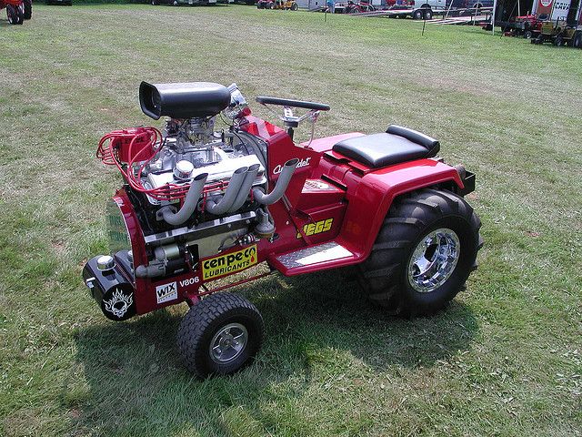 fd050b3a93dcc502dc3560613e5f6436-tractor-pulling-lawn-mower.jpg