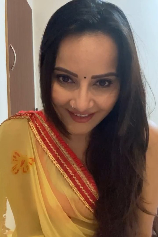 Geetanjali Mishra Sexy Cleavage and armpit though in Orange sleevless saree.mp4_snapshot_08.14.134