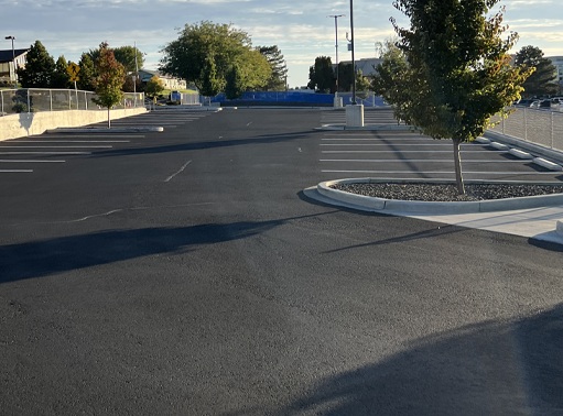 Fresh asphalt parking lot paving commercial project Nampa Idaho