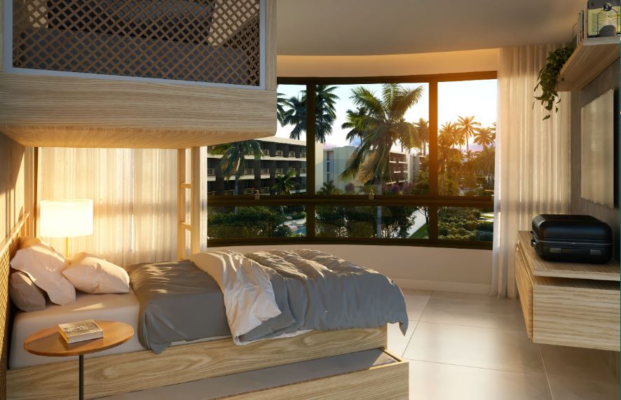 Quarto aconchegante com decoração moderna e vista para o mar