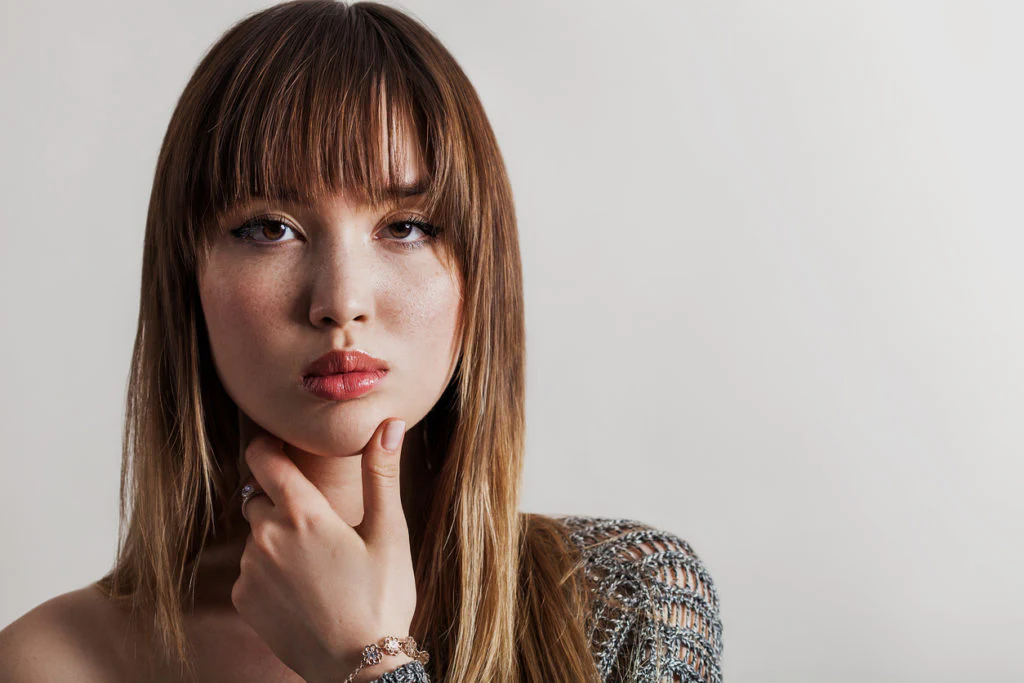 How can I make my thinning fringe appear fuller