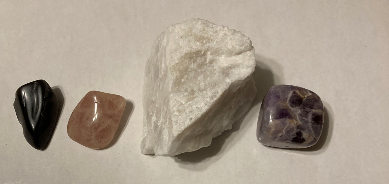 tumbled Rainbow Obsidian, Tumbled Red Aventurine, Raw Petalite, Tumbled Chevron Amethyst, 15 ml Blessed Manifestation Oil, information sheet