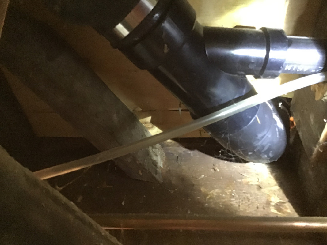 tub trap arm plumbed to toilet trap arm