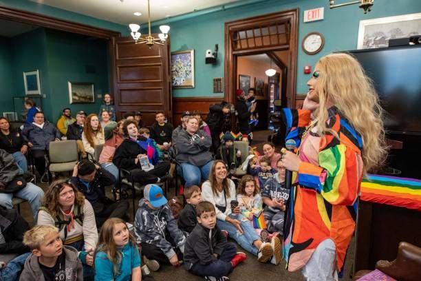jason-carter-in-drag-as-monica-moore-hosts-a-drag-story-hour-for-families-and-children-during.jpg