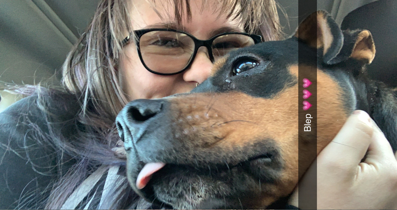 Kiana with her dog, Rosey.