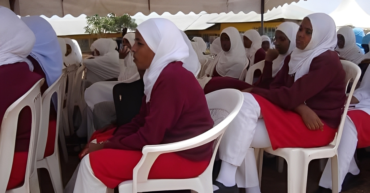 A large group of students from Islamic schools in Kenya at an event.