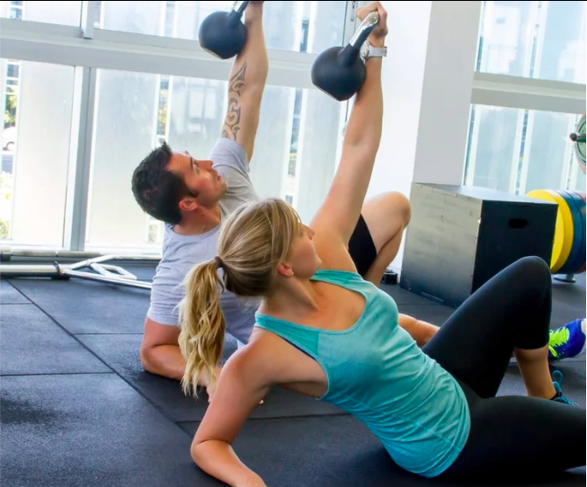 Personal trainer coaching client with progressive resistance training for muscle preservation in Christchurch