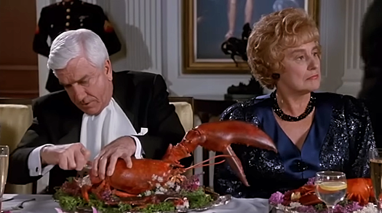 NAKED-GUN-JACQUELINE-BROOKS-2-FOTOR.png