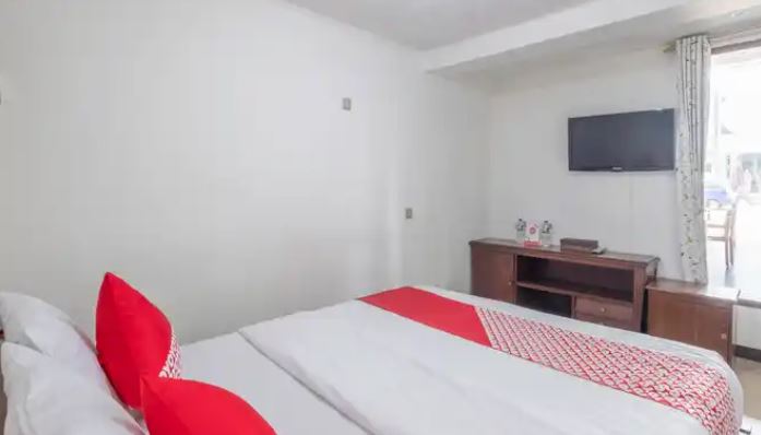 Kamar penginapan di OYO 1869 Hotel Buah Sinuan
