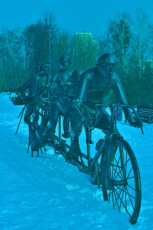 Cycling statue in the snow II