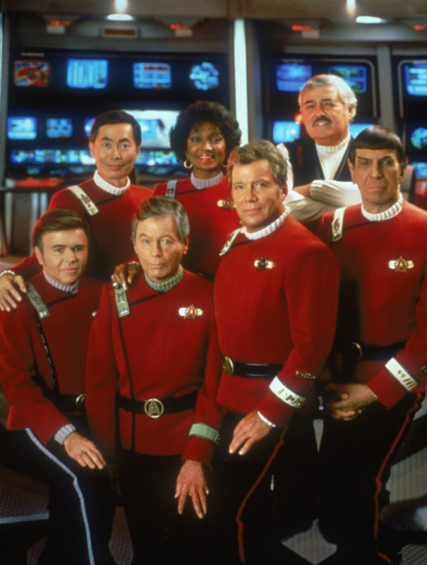 A famous picture of the senior staff of the Enterprise, as seen in Star Trek VI. From left to right, and back to front, they're Hikaru Sulu, played by George Takei, Nyota Uhura, played by Nichelle Nichols, Montgomery Scott, played by James Doohan, Pavel Chekov, played by Walter Koenig, Leonard McCoy, played by DeForest Kelley, James Kirk, played by William Shatner, and Spock, played by Leonart Nimoy