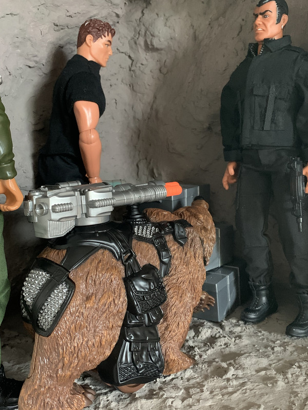 Smugglers caught checking their stolen loot by Action Man and his grizzly bear. A913-A72-F-081-F-4-FDE-94-C5-49-F6-D36386-E3