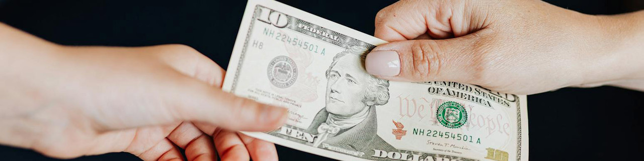 A man giving money to other