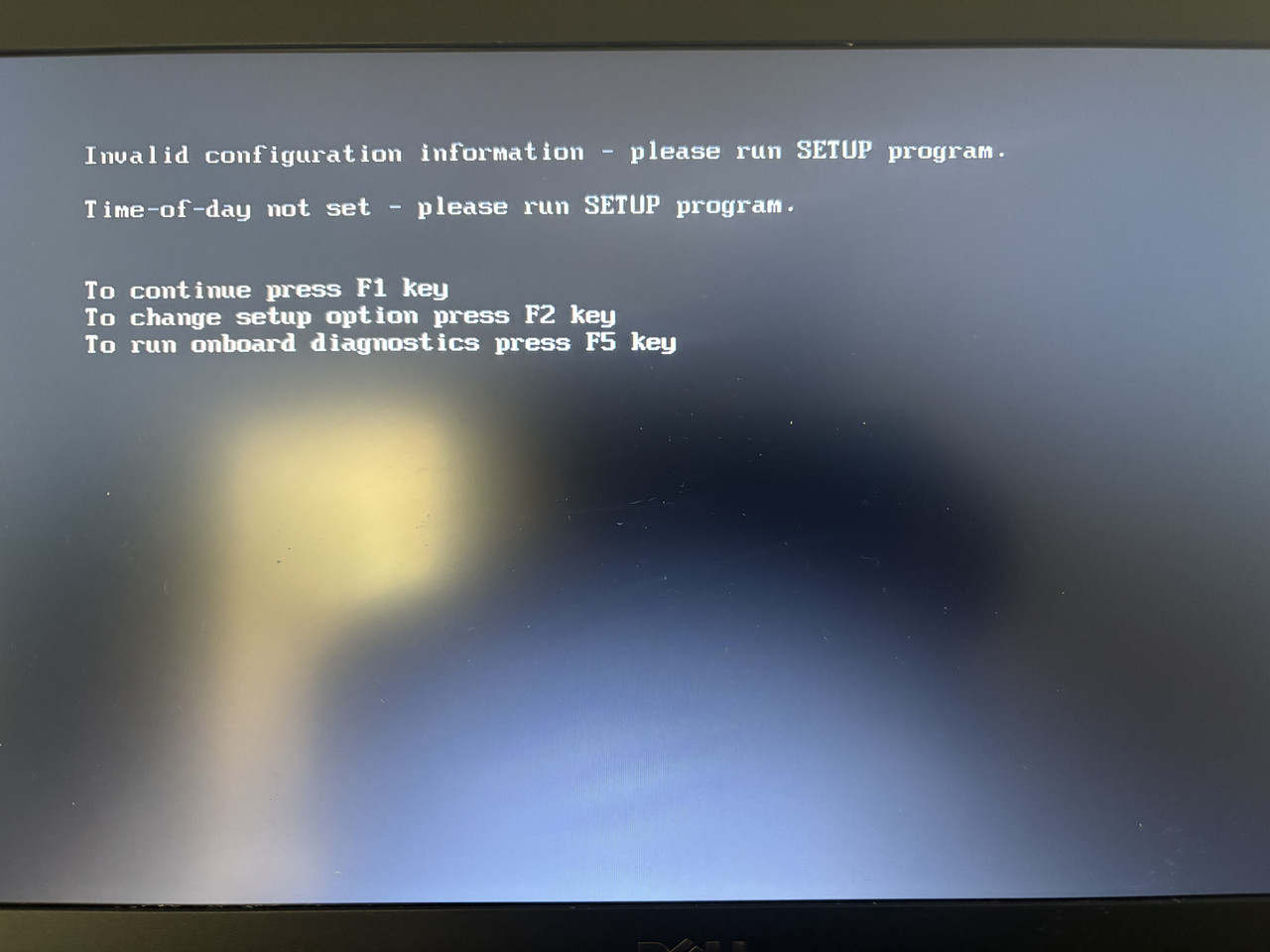 Powered on — “Invalid configuration / Time-of-day not set” BIOS error