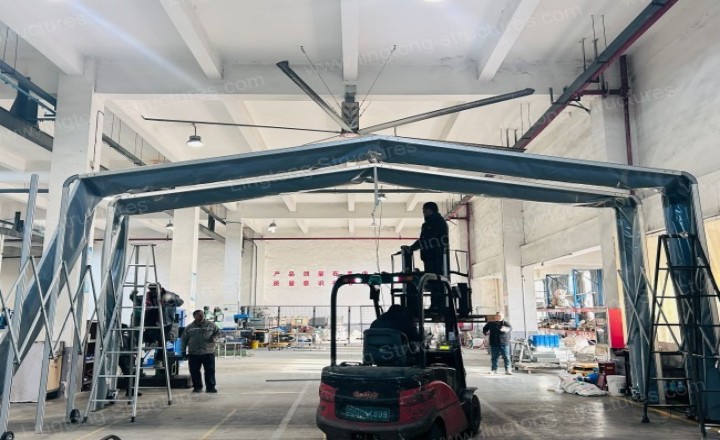 Retractable tent used for outdoor equipment maintenance