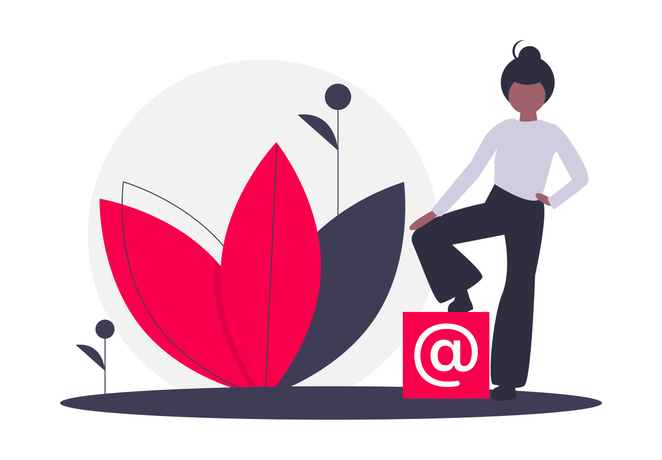 a girl standing on a @ symbol