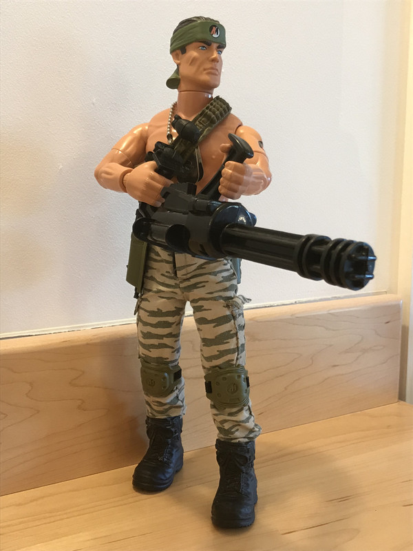 Action Man holding a high speed Gatling gun. FBB4675-A-AE41-4724-B471-2-DC567-FABD76