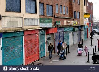 urban-decay-uk-boarded-up-shuttered-shops-and-flats-symes-avenue.jpg