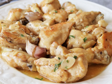 Medio pollo al ajillo