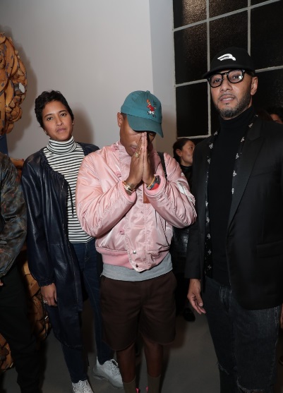 Pharrell Williams At The DreamWeavers Exhibition Opening Celebration