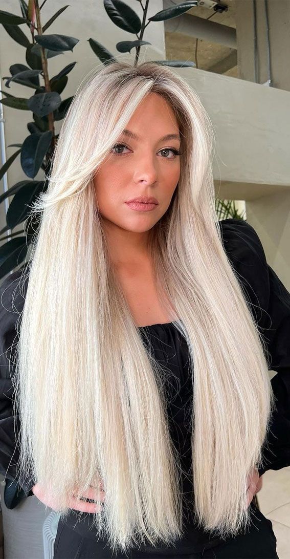 Very long lush straight platinum blonde hair