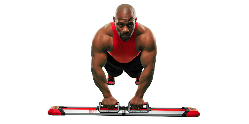 Image of man using a chest exercise system