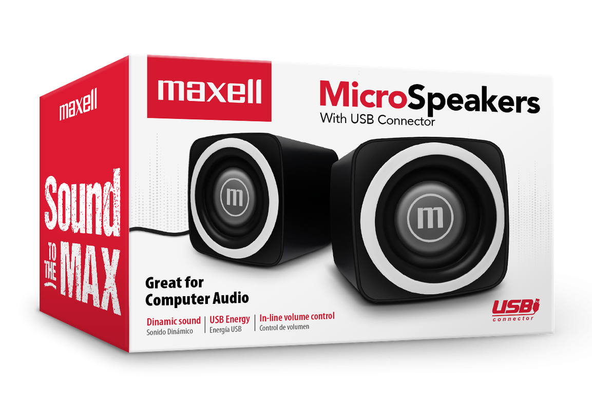 Una persona utilizando las bocinas Maxell junto a su laptop.