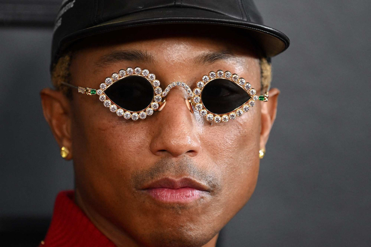 7 of Pharrell Williams' most iconic fashion moments: from his rare purple  Hermès Birkin to a reflective Adidas suit, diamond Tiffany & Co. sunglasses  – and that vintage Vivienne Westwood hat