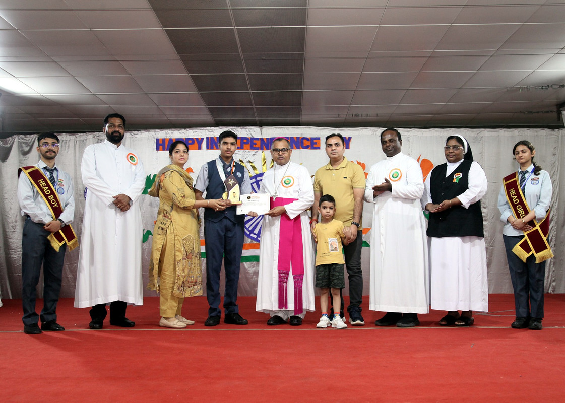 Raj receiving medal 3