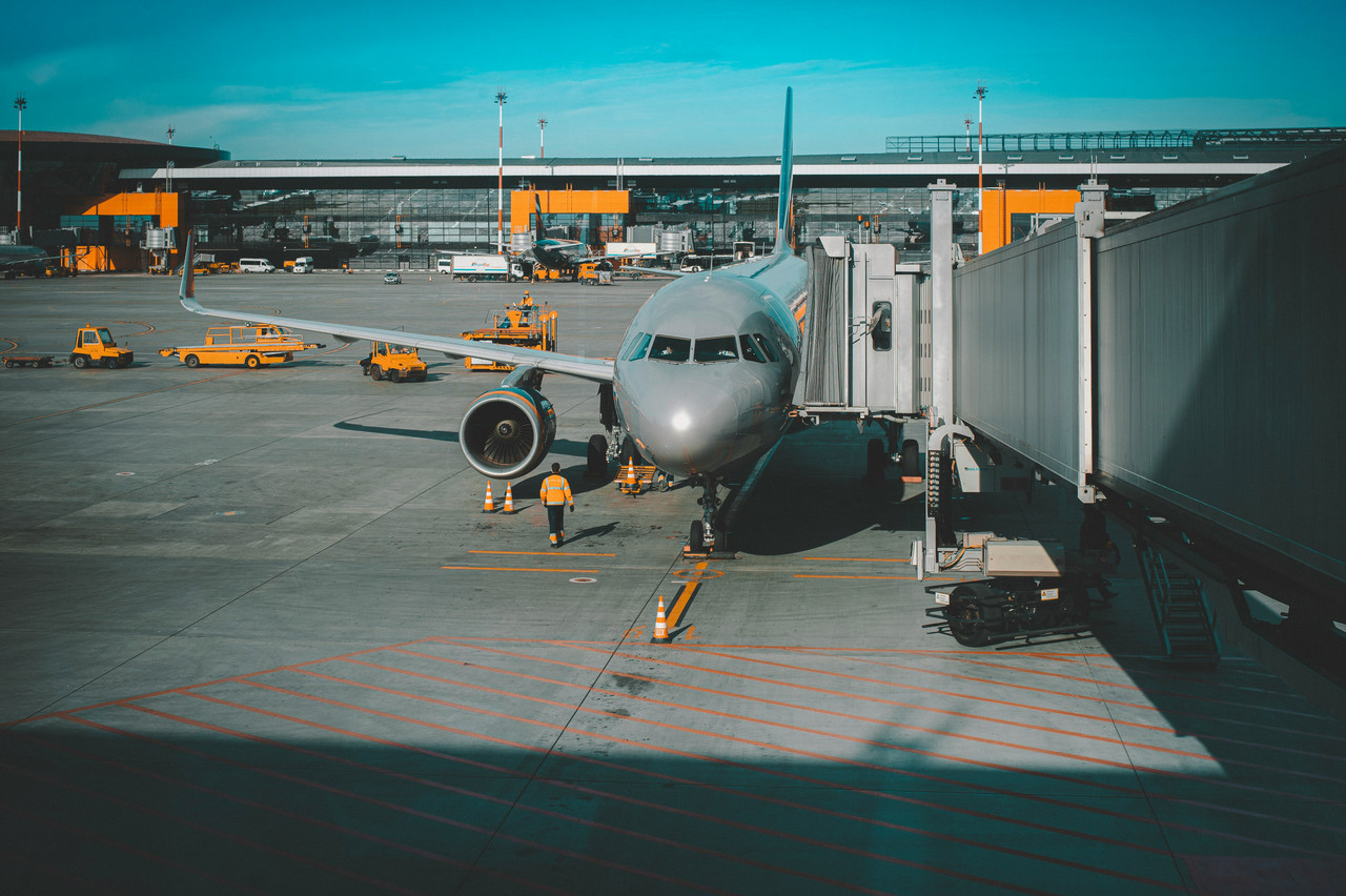 Traveler checking a flight itinerary on the way to their gate