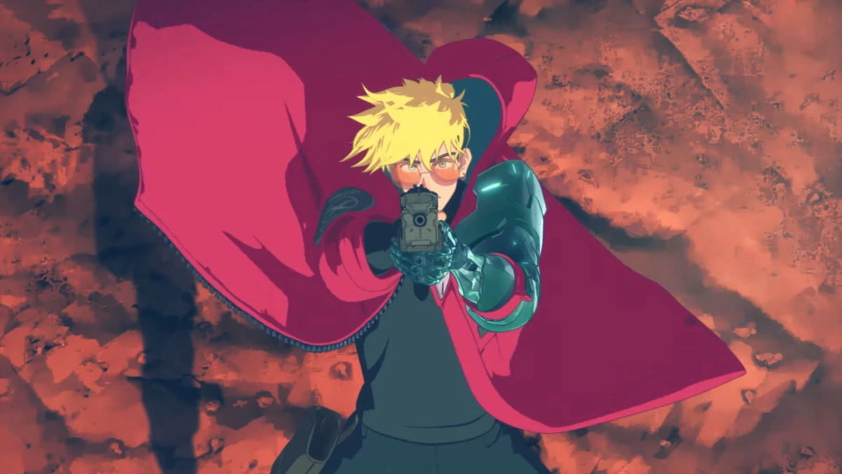 A screenshot from Trigun Stampede with Vash in an action pose, pointing his gun at the camera.