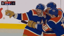 https://i.postimg.cc/mgwpj9tG/edmonton-oilers-evan-bouchard.gif