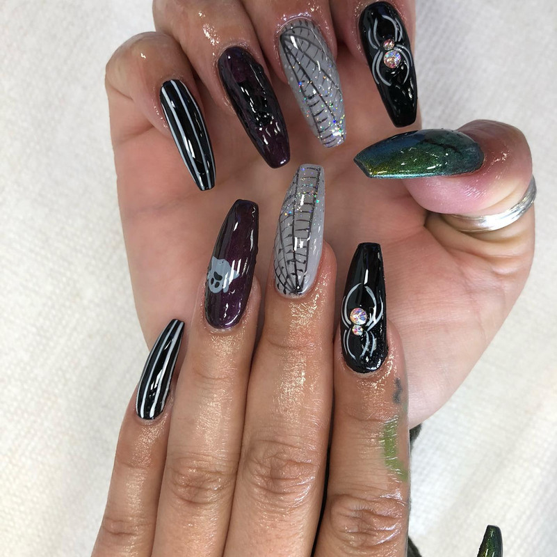 Black and gray spiderweb nail art design