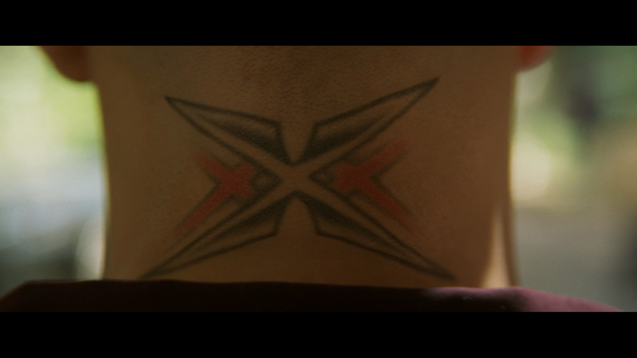 вин дизель сзади. вин дизель наколки. вин дизель три икса фото. три икса фильм 2002. тату три икса.