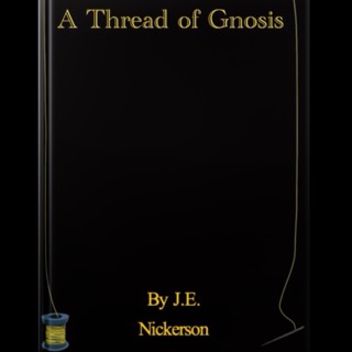 Black book with gold thread detailing around the edges, resting on a neutral surface.