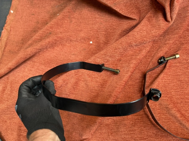Exhaust silencer retaining straps