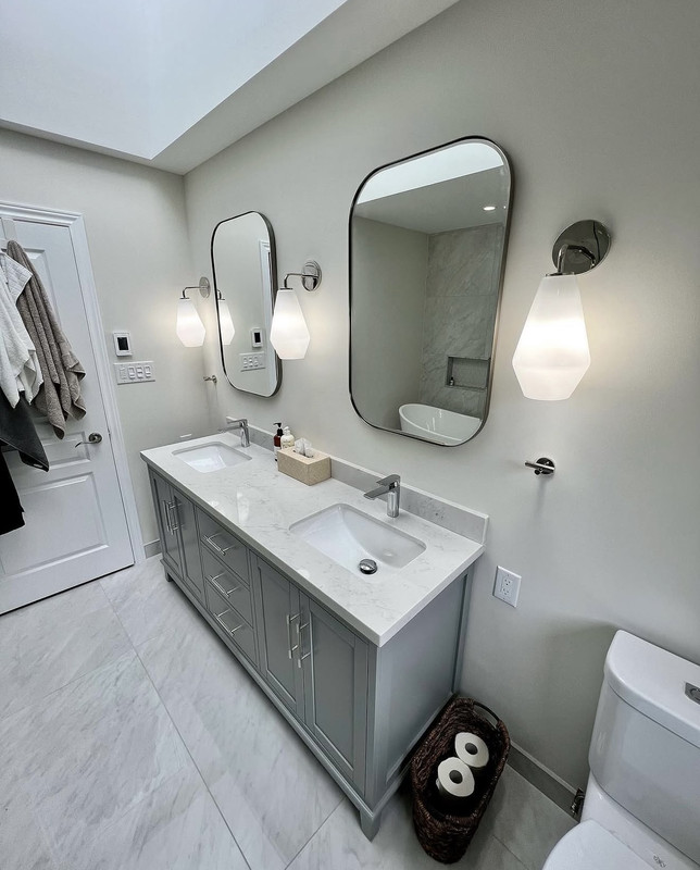 Full vanity wall with both sinks and mirrors