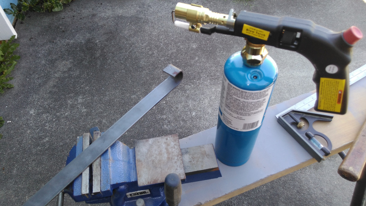 Heating-and-forming-the-table-hangers.jpg