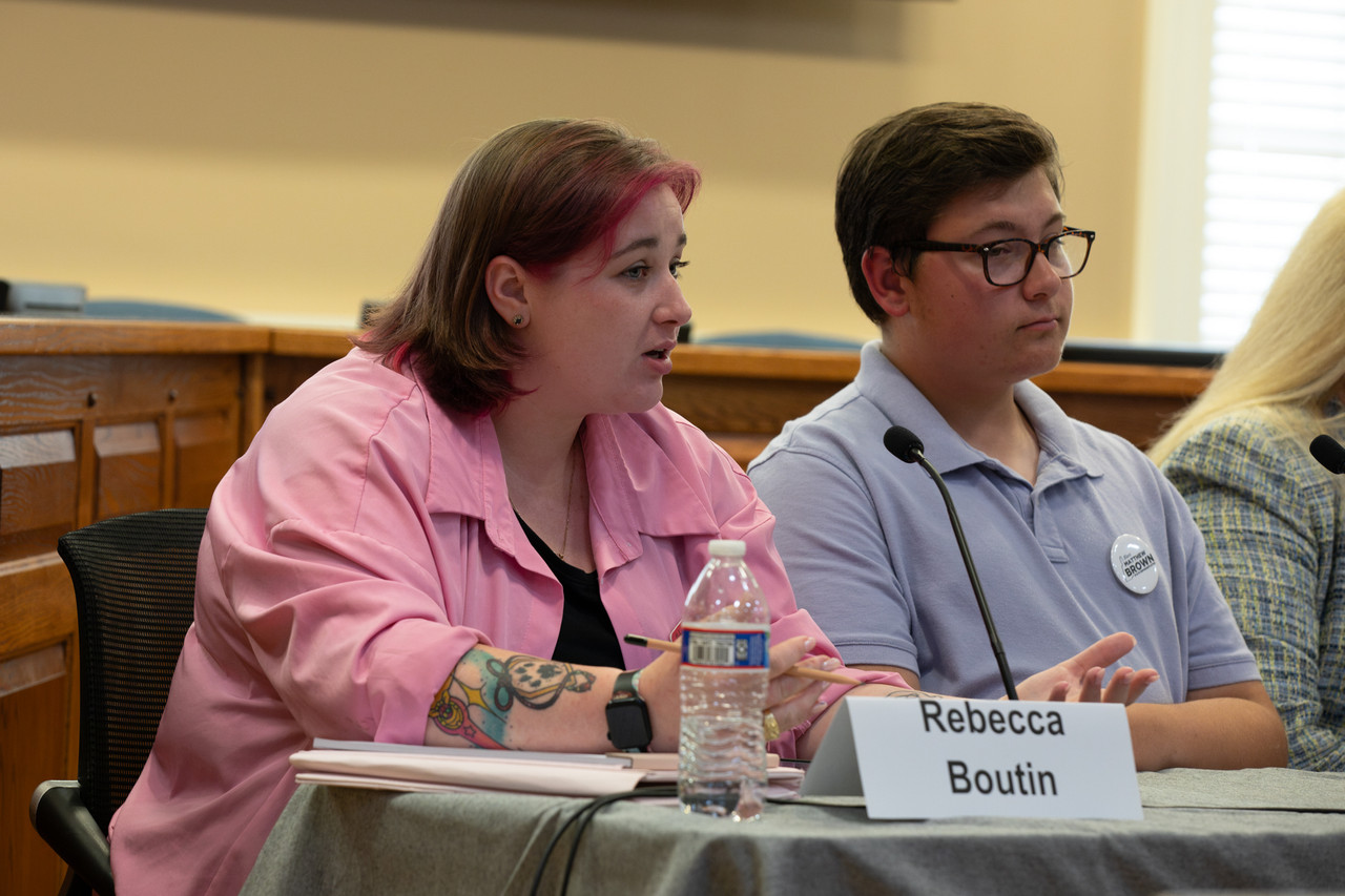 Rebecca Boutin speaking at a candidates forum
