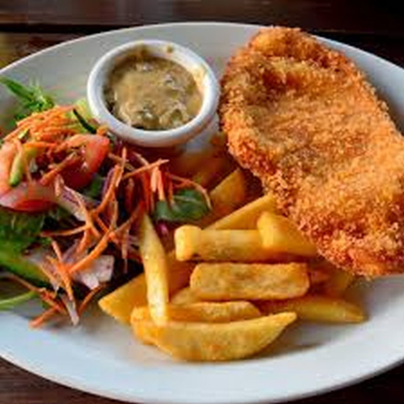 Mega Schnitzels With Fries and Salad