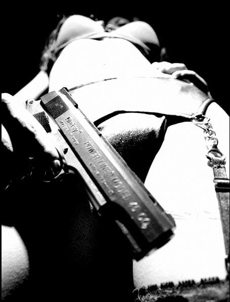 http://i288.photobucket.com/albums/ll165/TheHomelessPoet/Girl%20Pictures%202/GunGirl25.jpg