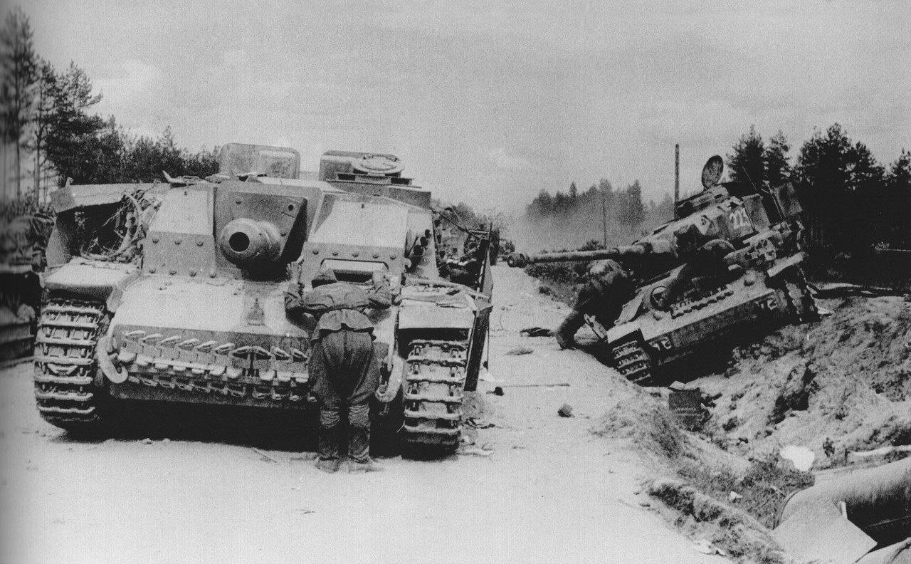 StuH 42 from Sturmgeschütz Abteilung 244 and Panzer IV #223 wrecks in the Minsk area, July 1944