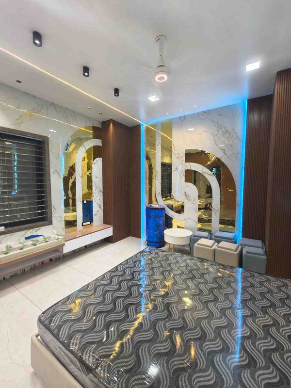 Bedroom interior and wallpaper installation by interior designers in Mumbai