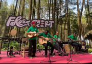 Group photo of Rumah Sahabat Indonesia (KRSI) members after a music rehearsal