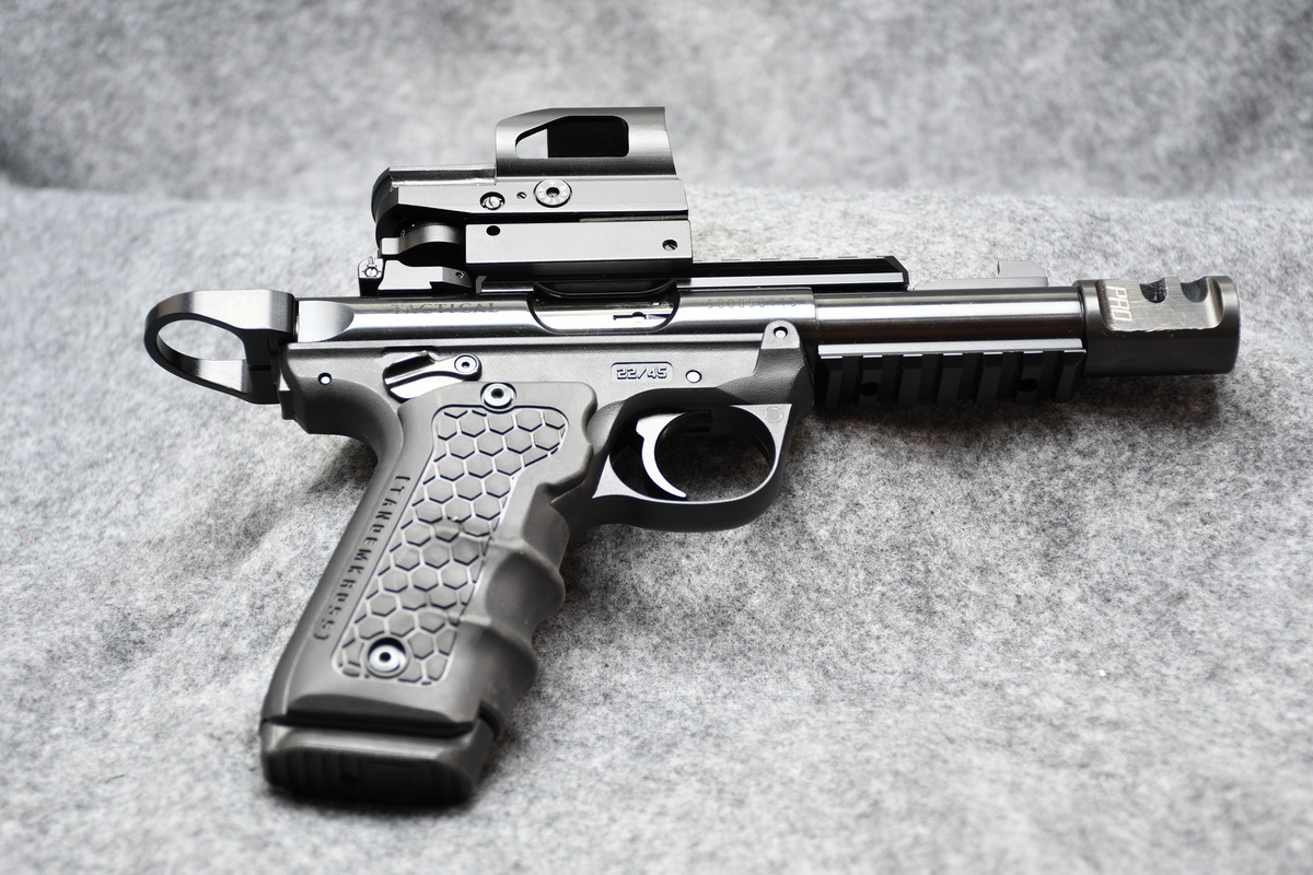 OK, I am now trying to decide between the Browning Buckmark and the Ruger M...